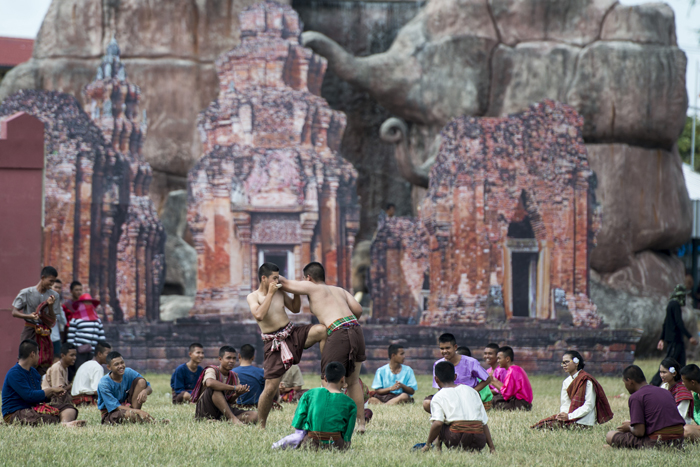 Muay Thai demonstration near ancient Thai ruins