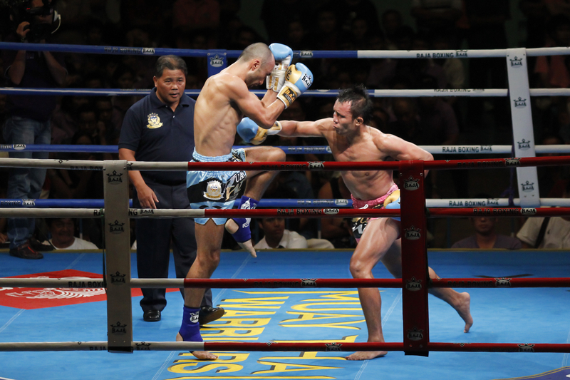 This is a Muay Thai fight taking place in the ring