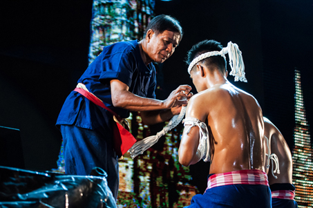 Muay Thai fighter praying