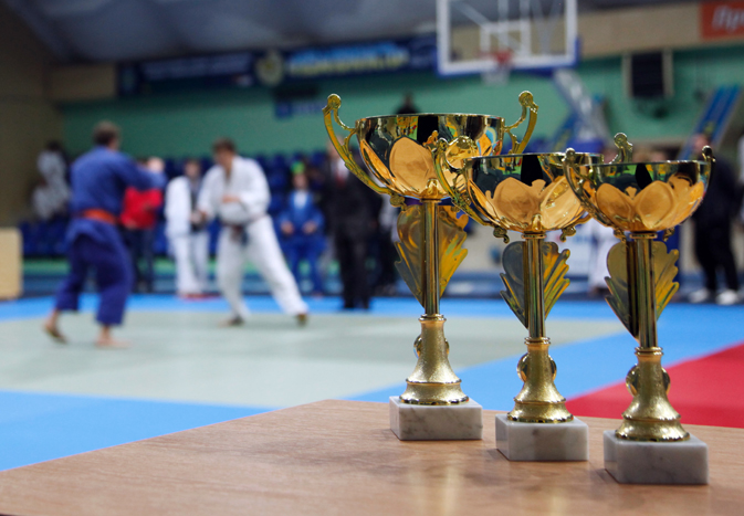 Judo competition with gold medals upfront