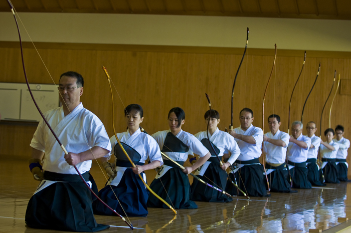 Kyudo practitioners in a dojo training