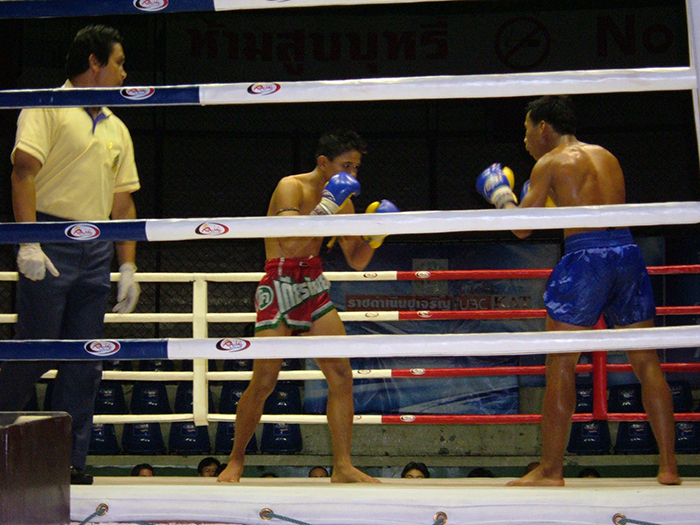 Muay Thai fight at Rajadamnern Stadium in Bangkok