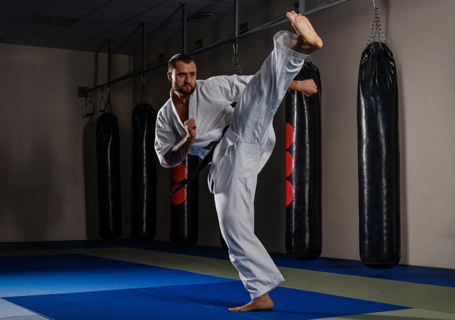 Karate practitioner performing a kick