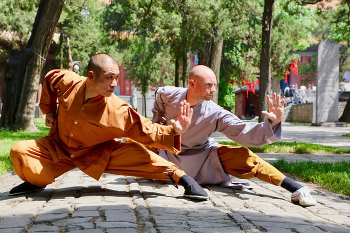 Two Shaolin Kung Fu students practicing