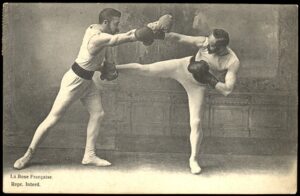 This is an old black and white photograph of savate