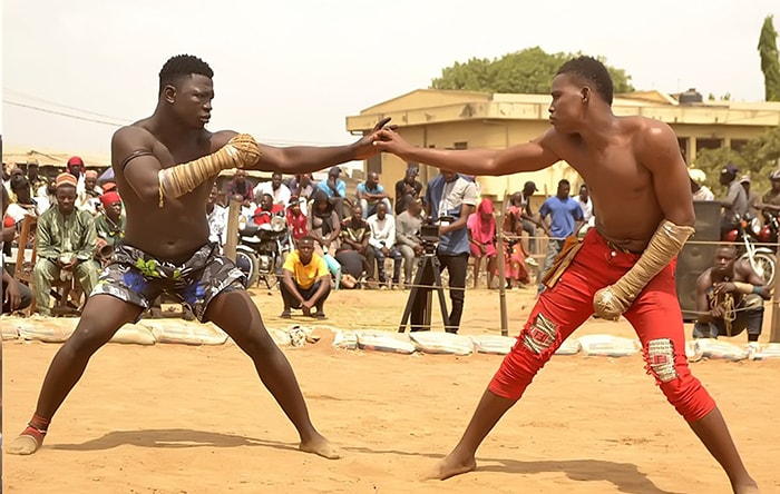 Dambe fight taking place with two fighters