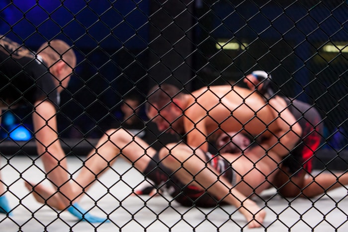 MMA fighters competing in the cage